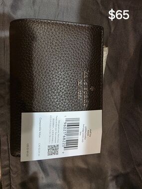 kate spade Brown Pebbled Leather Bifold Wallet with Gold Logo